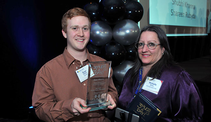 PLASP volunteer Evan Maltby is presented with his five year service award