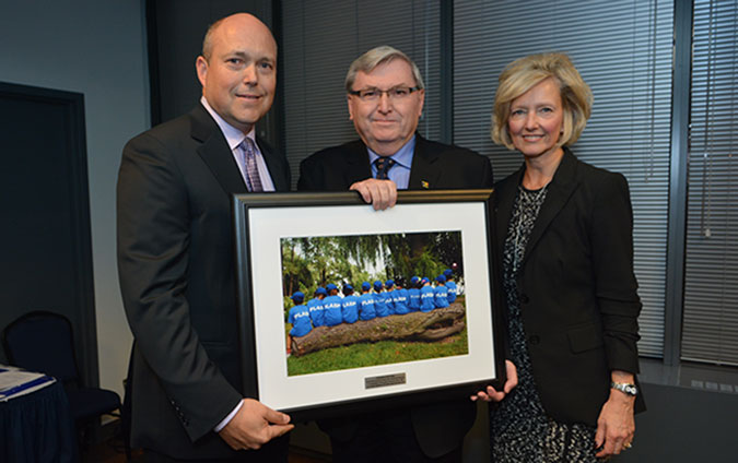 PLASP CEO Lynn Hiebert, Board President Paul Kranjac and outgoing Board President Glen Shipp