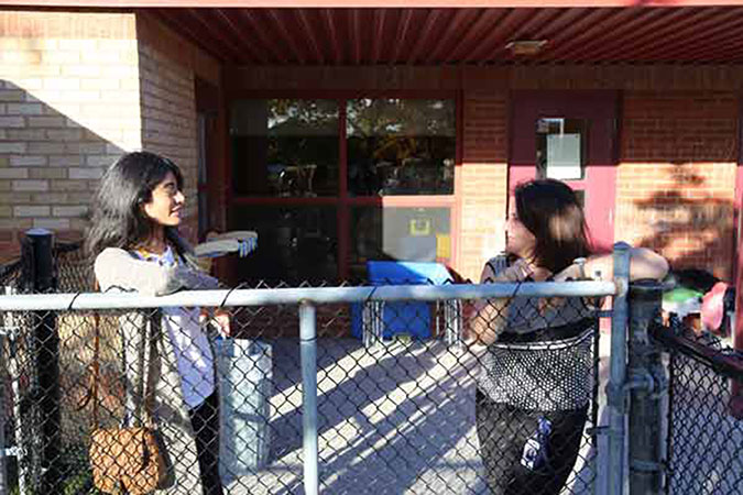 New mom Noreen with a PLASP program staff member