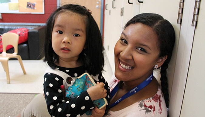 A PLASP student on placement with a child
