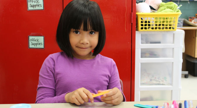 A child in a PLASP program