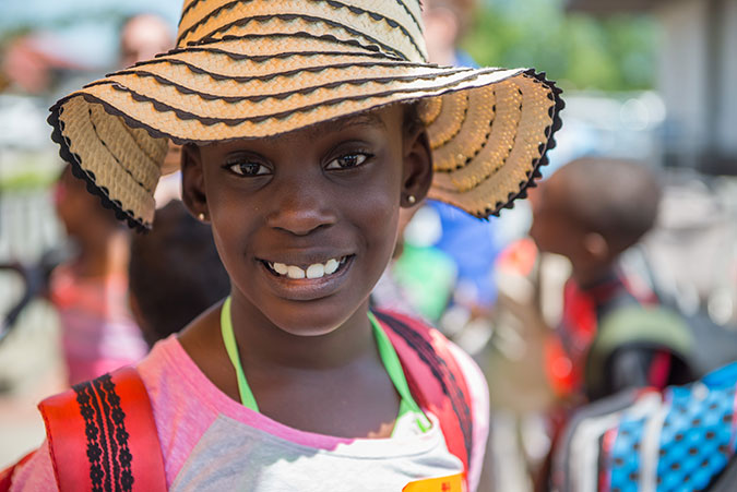 A girl with a wide brimmed hat