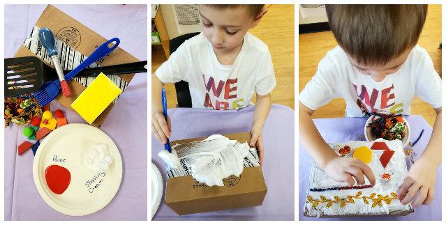 Boy painting a box