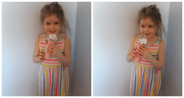 Girl singing into a pretend microphone