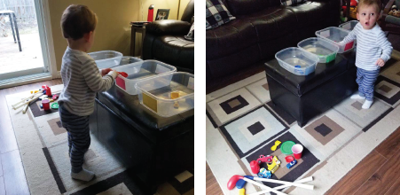Child sorts toys into colour coordinated containers
