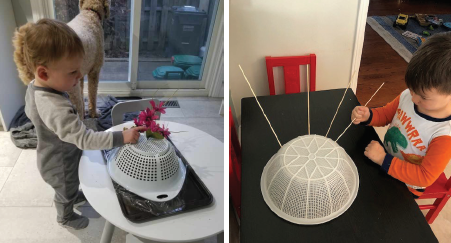 Children polking objects through the holes of kitchen colanders